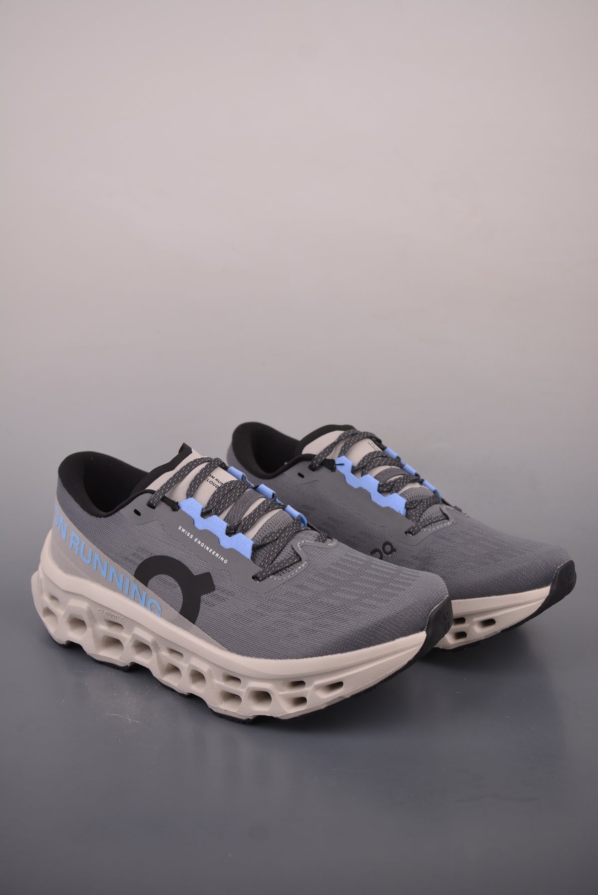 On Cloudmonster 3 "Rock / Silver"