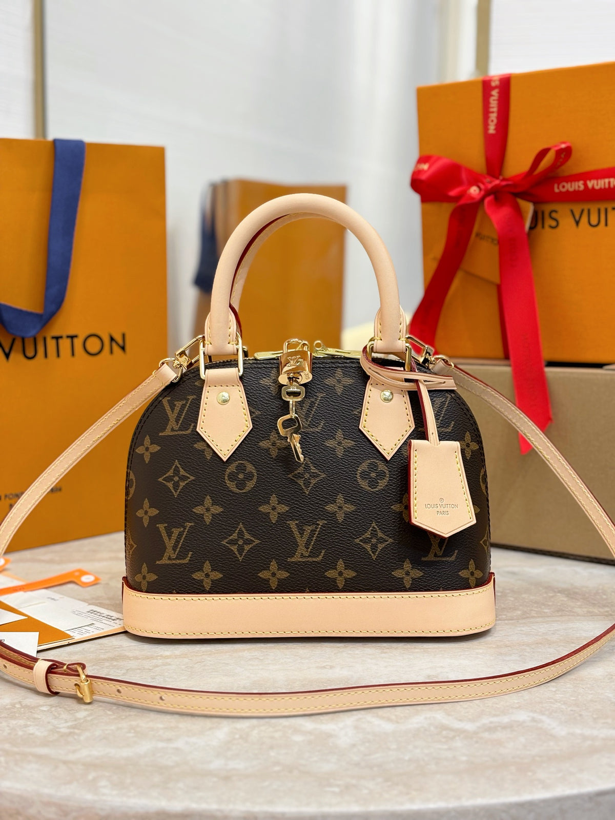 Louis Vuitton Alma BB in Monogram Canvas bag